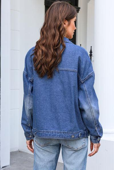 a woman wearing a denim jacket and jeans
