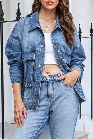 a woman wearing a denim jacket and jeans