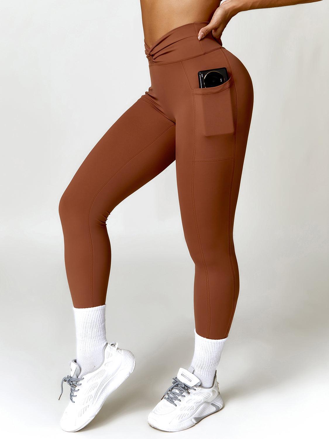 a woman wearing a pair of brown leggings