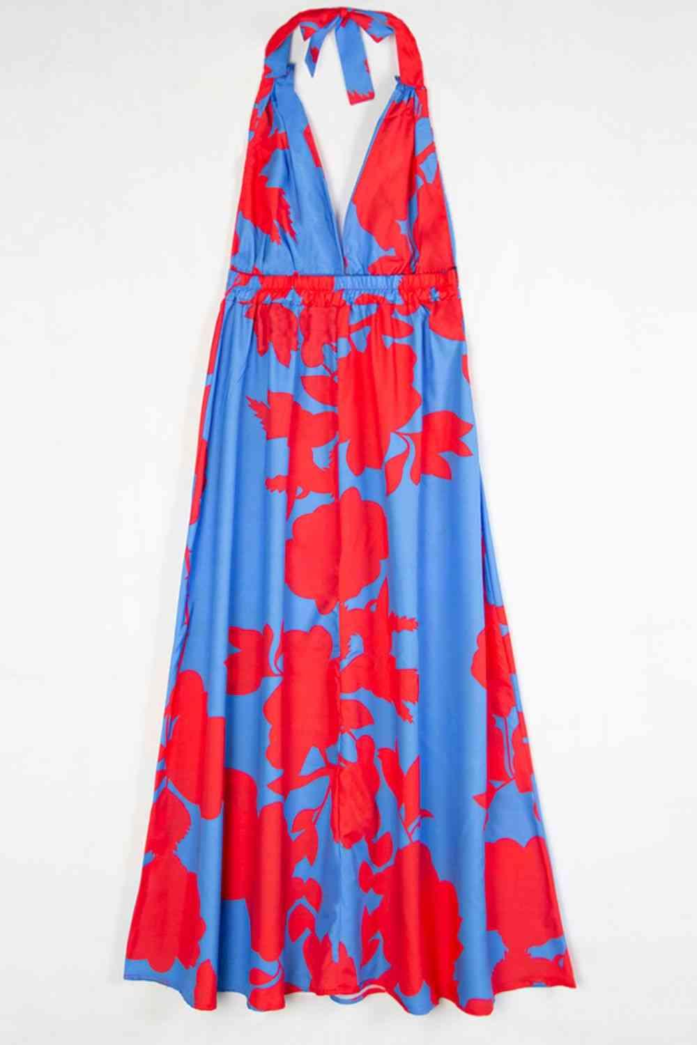 a red and blue dress hanging on a wall