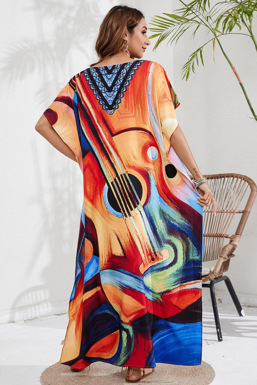 a woman in a colorful dress standing next to a chair