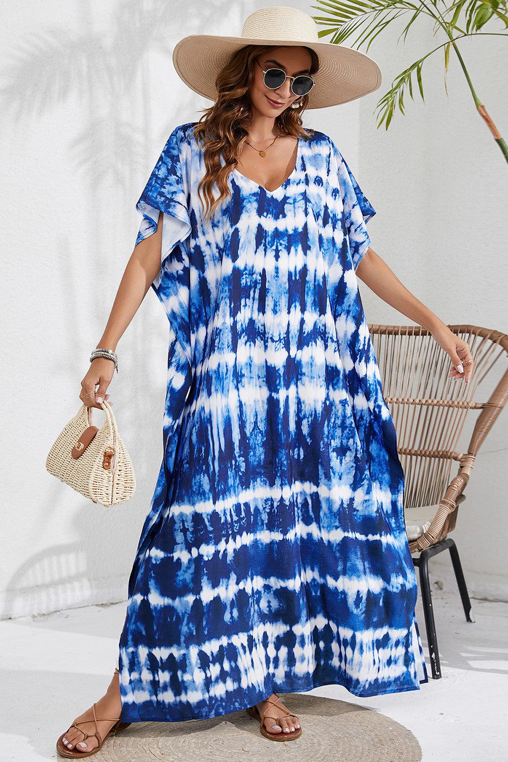 a woman wearing a blue and white tie dye dress