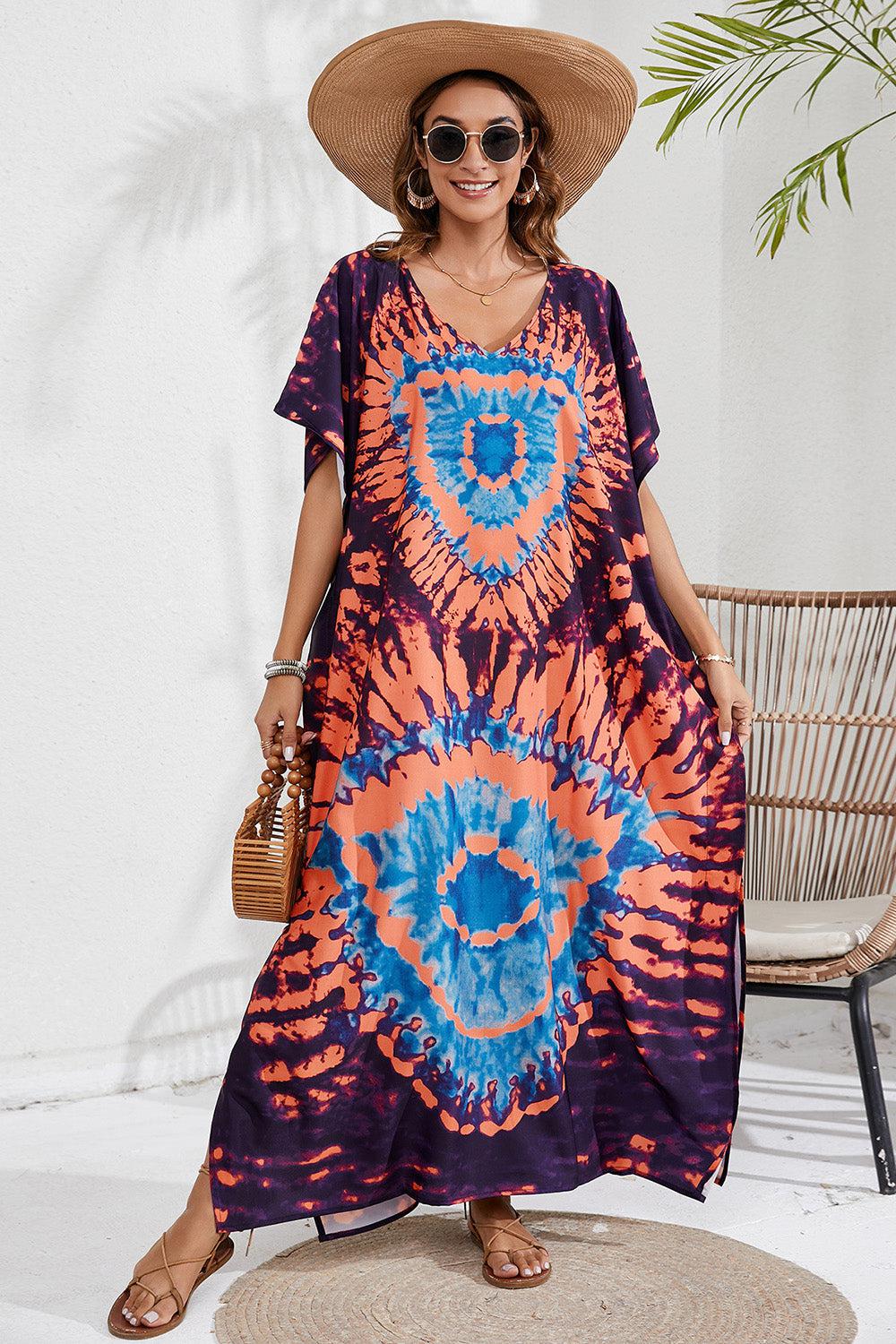 a woman wearing a large hat and a colorful dress