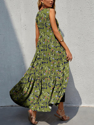 a woman wearing a green floral print dress