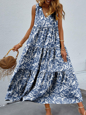 a woman wearing a blue and white dress