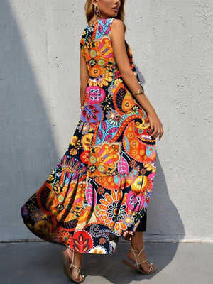 a woman wearing a colorful dress and sandals