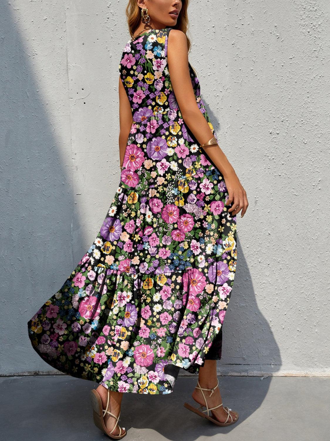 a woman in a long dress standing against a wall