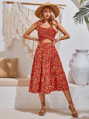 a woman wearing a red dress and a straw hat