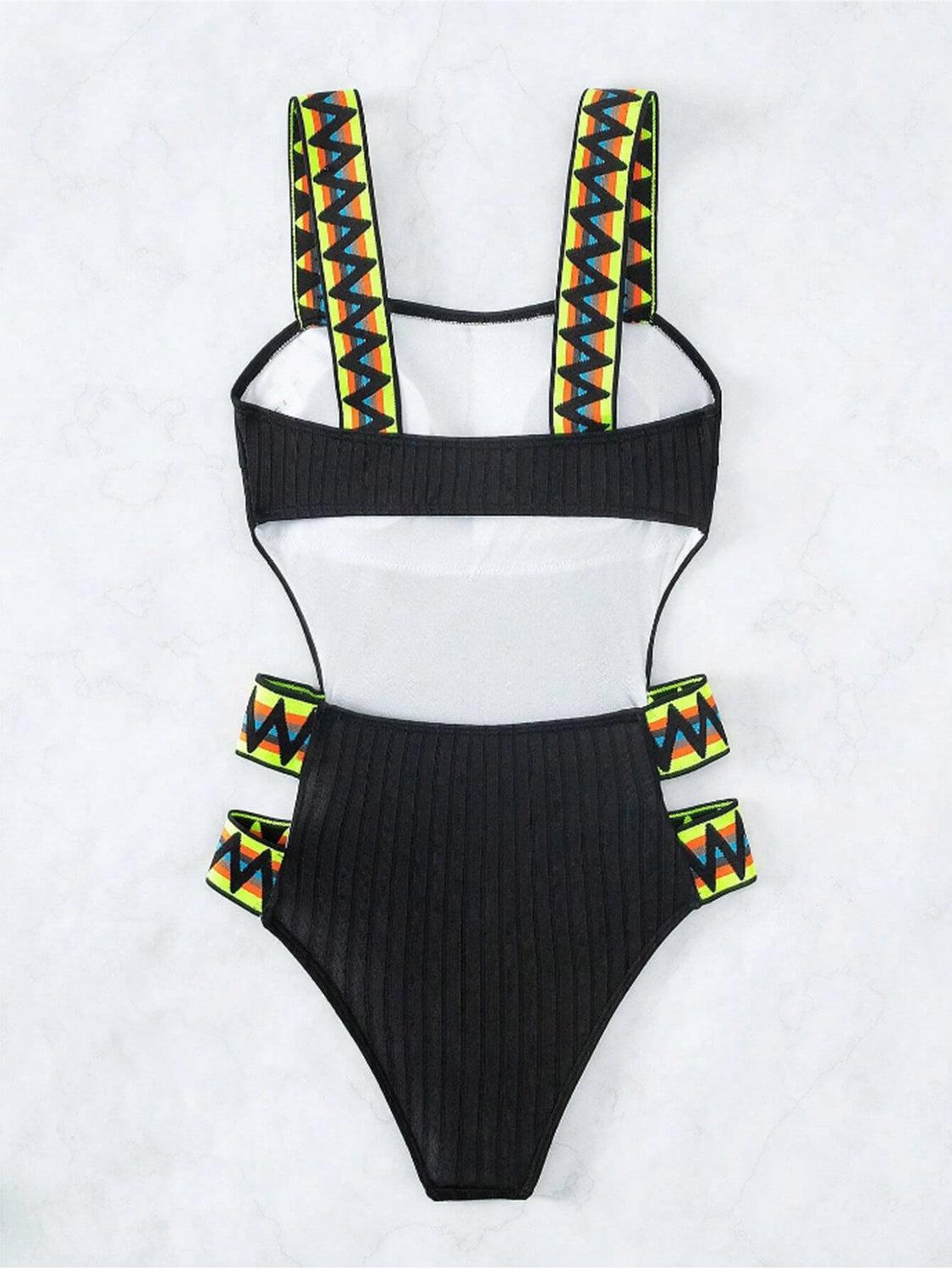 a bathing suit with straps on a white background