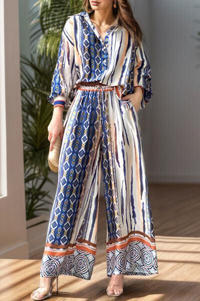 a woman in a blue and white print jumpsuit