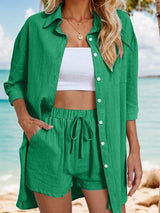 a woman wearing a green shirt and shorts