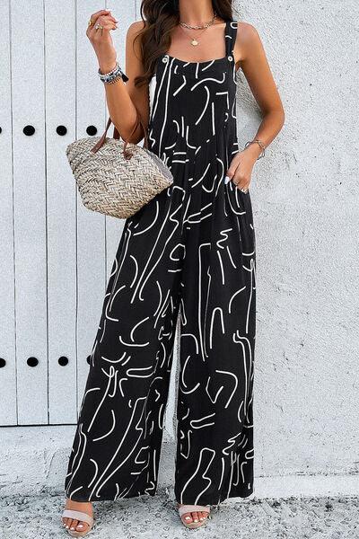 a woman in a black and white jumpsuit holding a straw bag