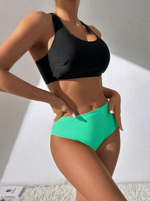 a woman in a black top and green panties