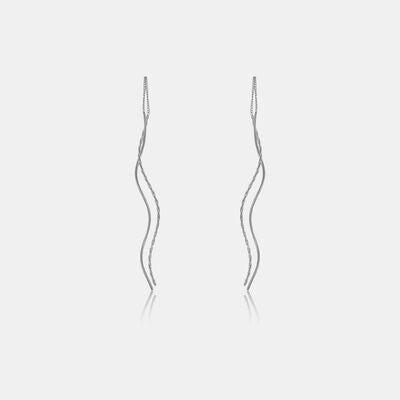 a pair of silver earrings on a white background