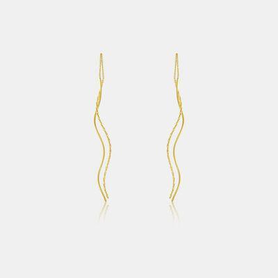 a pair of yellow gold earrings on a white background