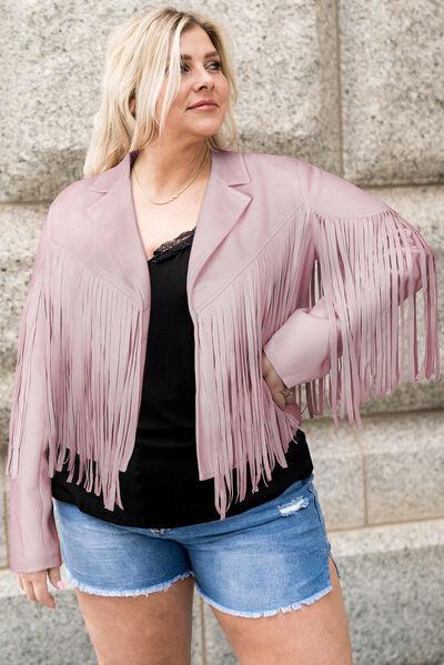 a woman wearing a pink jacket and shorts