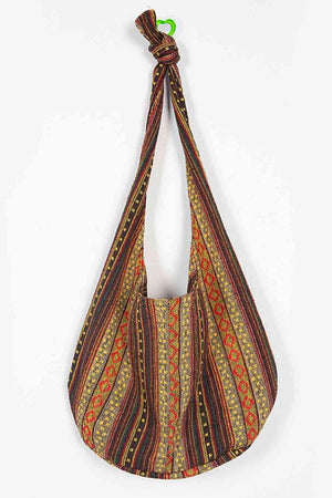 a multicolored bag hanging from a hook