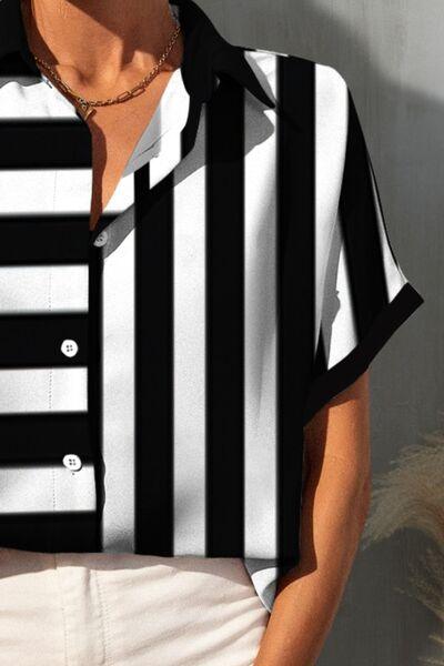 a woman wearing a black and white striped shirt