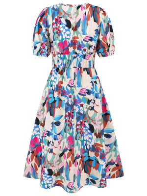 a women's dress with colorful flowers on it