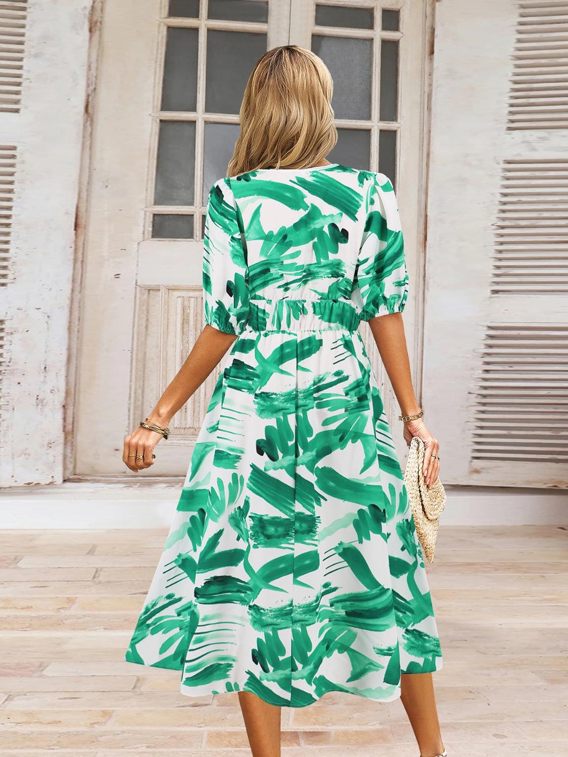 a woman in a green and white dress