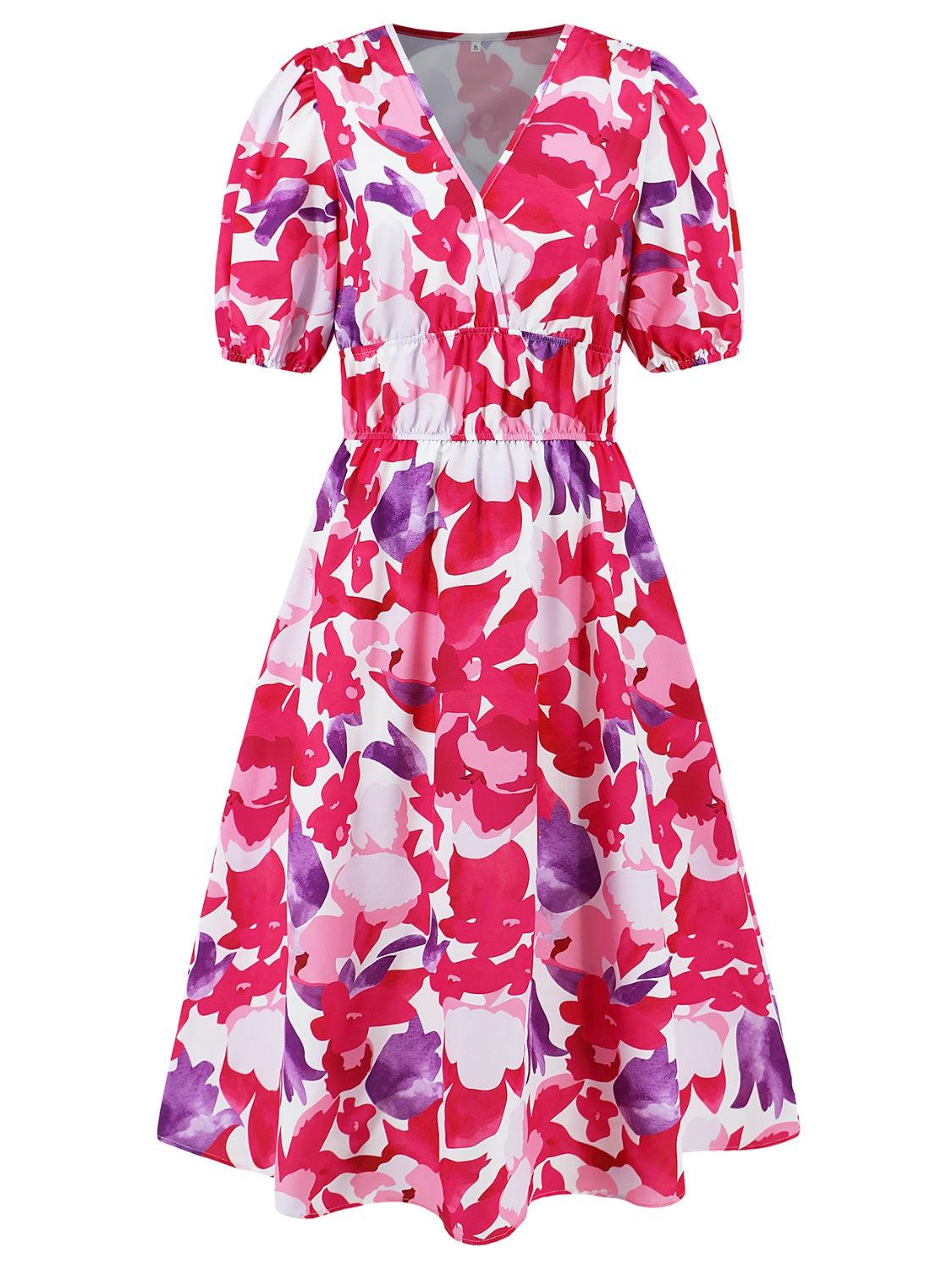 a pink and purple dress with a floral pattern