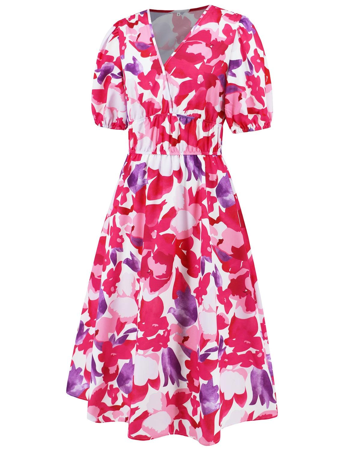 a women's dress with pink and purple flowers