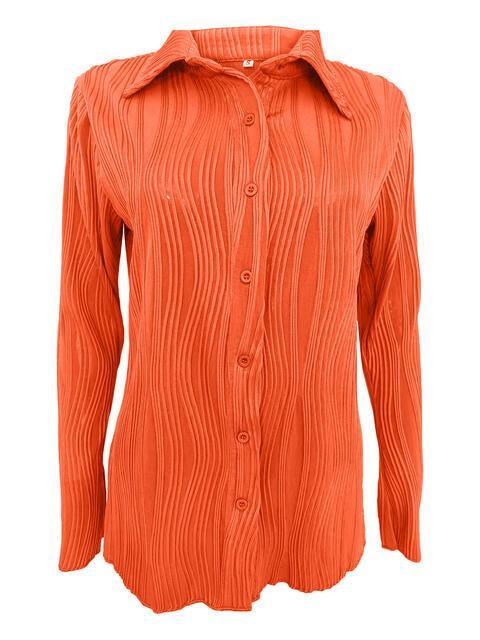 a women's blouse with a pleated collar