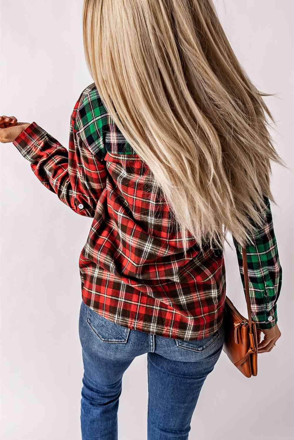 a woman wearing a red and green plaid shirt