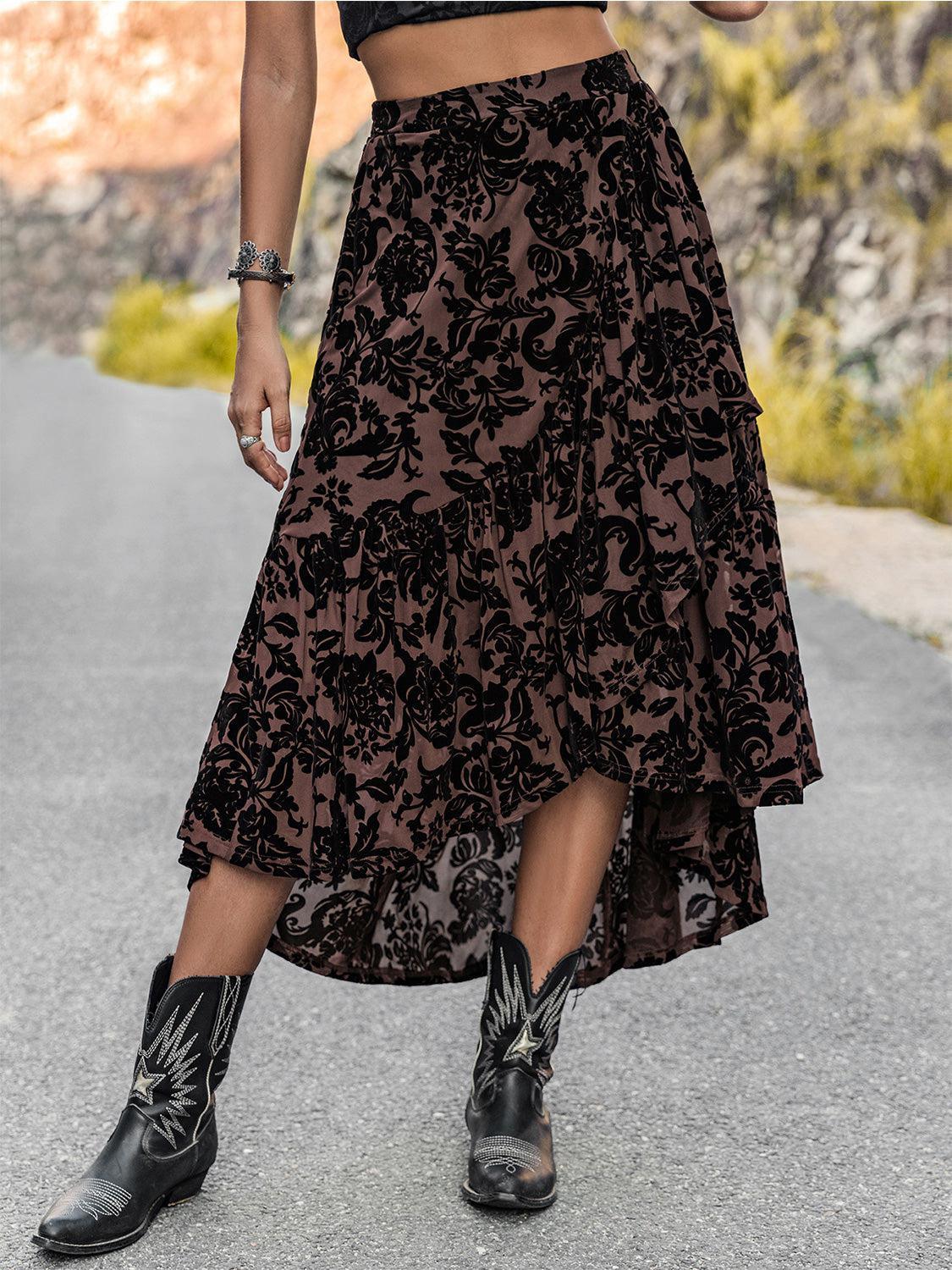 a woman wearing a skirt and cowboy boots