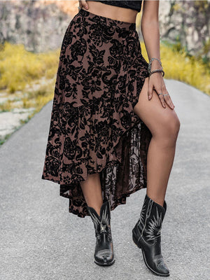 a woman in a black top and a brown skirt