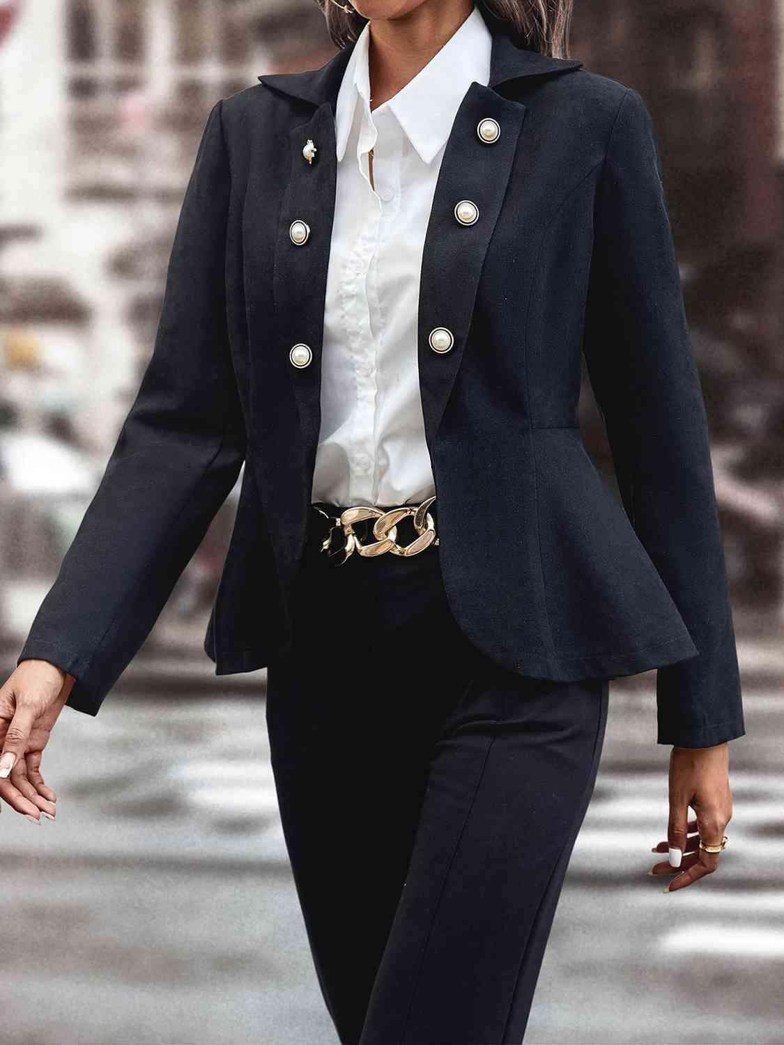 a woman walking down a street in a suit