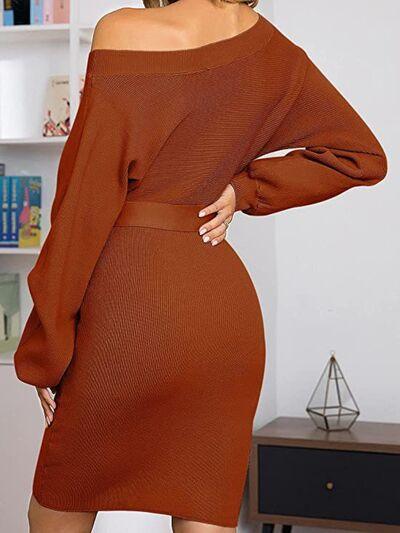 a woman in a brown sweater dress