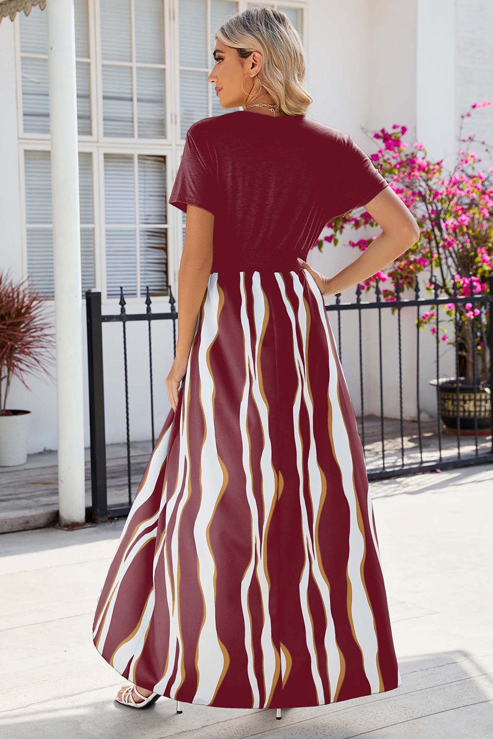 a woman in a red and white striped dress