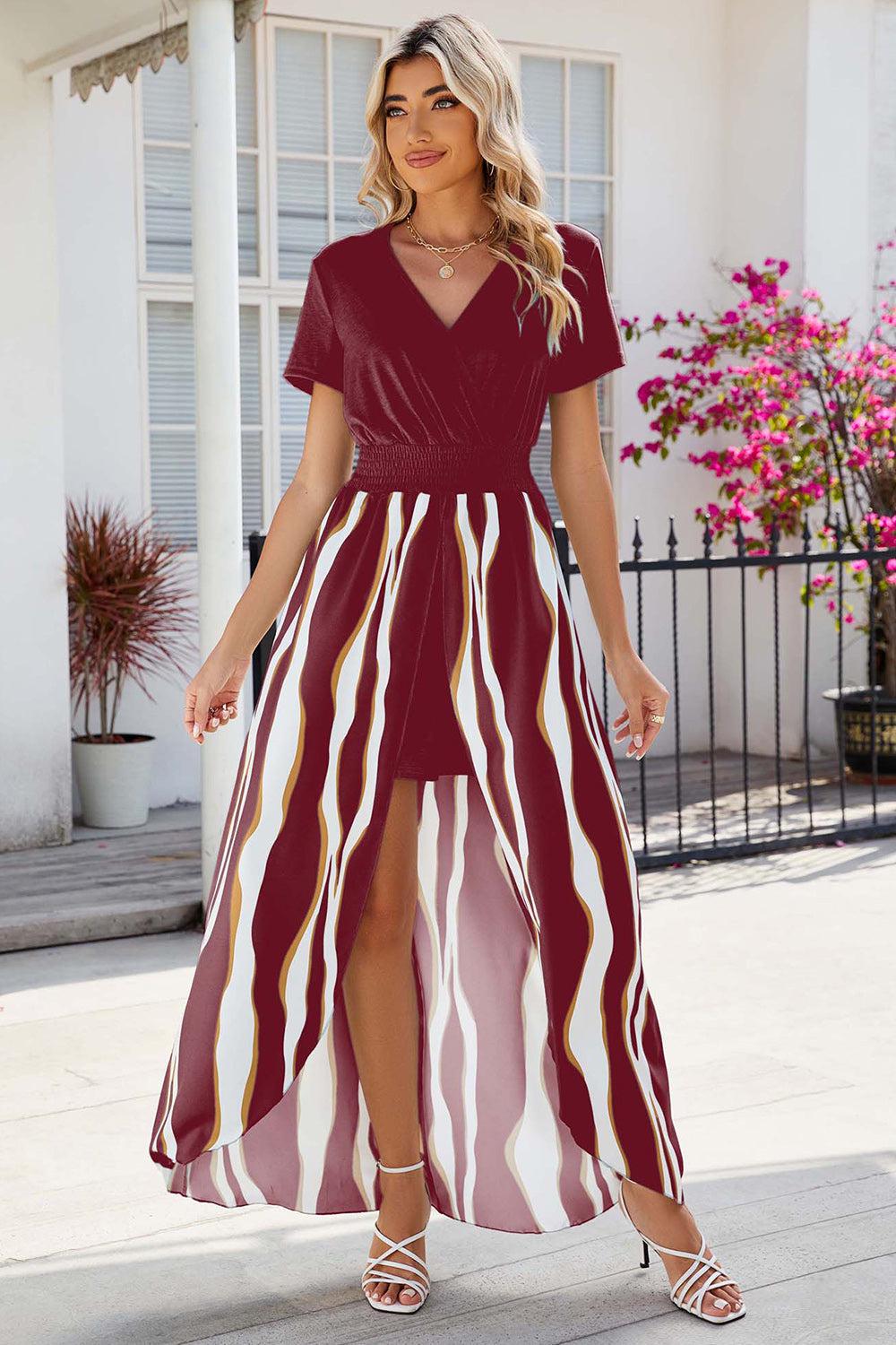 a woman wearing a red and white striped dress