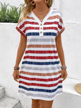 a woman wearing a red, white, and blue striped dress