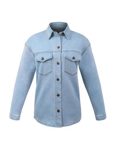 a light blue jean jacket with buttons on the chest
