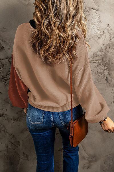 a woman with long hair is holding a brown purse
