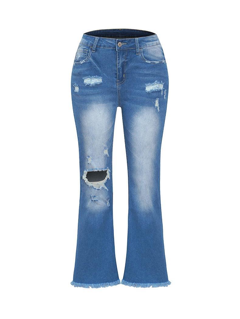 a pair of blue jeans with a hole in the side