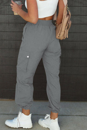 a woman standing in front of a garage door