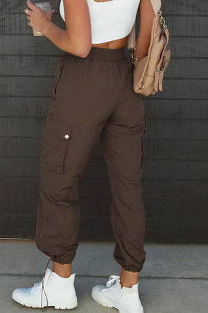 a woman standing in front of a garage door