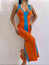 a woman in an orange and blue dress