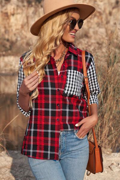 a woman wearing a hat and a plaid shirt