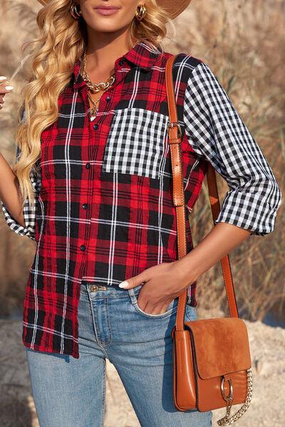a woman wearing a hat and a plaid shirt