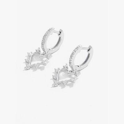 a pair of earrings with a heart and arrow