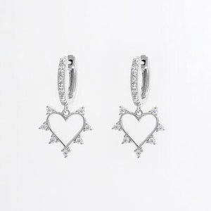 a pair of heart shaped earrings on a white background