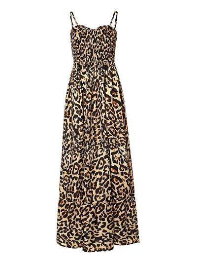 a leopard print dress on a white background