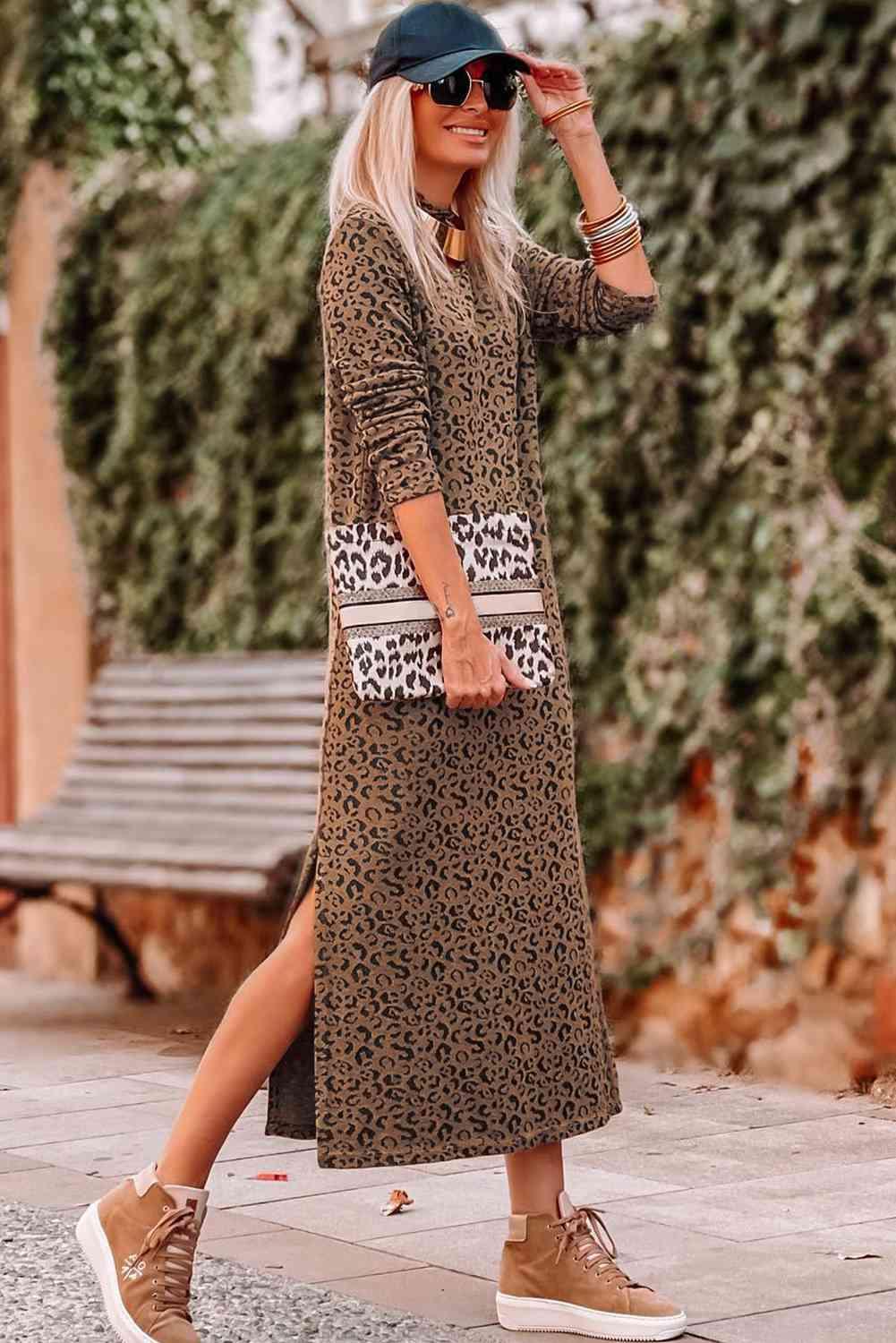 a woman wearing a leopard print dress and sneakers