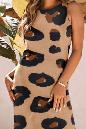 a woman posing in a leopard print dress