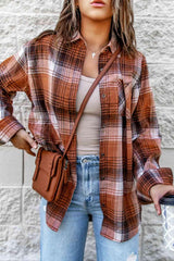 a woman standing in front of a wall with her hands on her hips