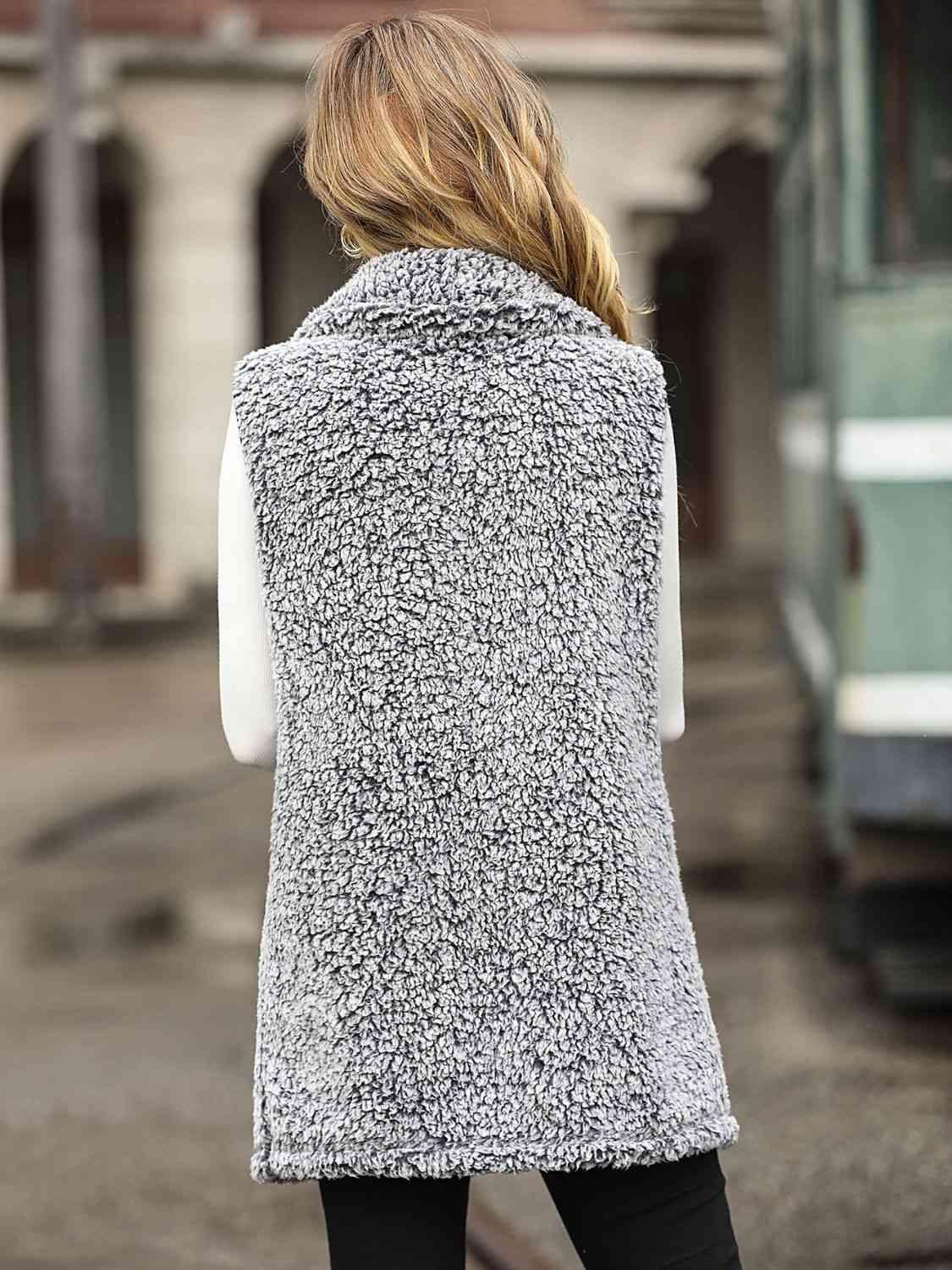 a woman is walking down the street wearing a coat